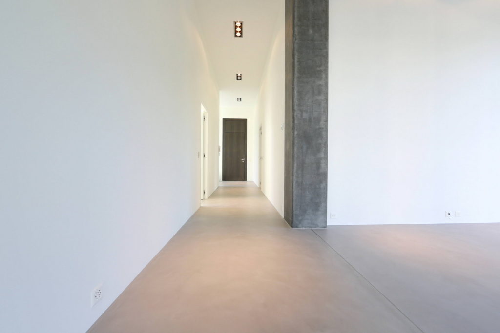 Rénovation d'une chape cirée en béton ciré