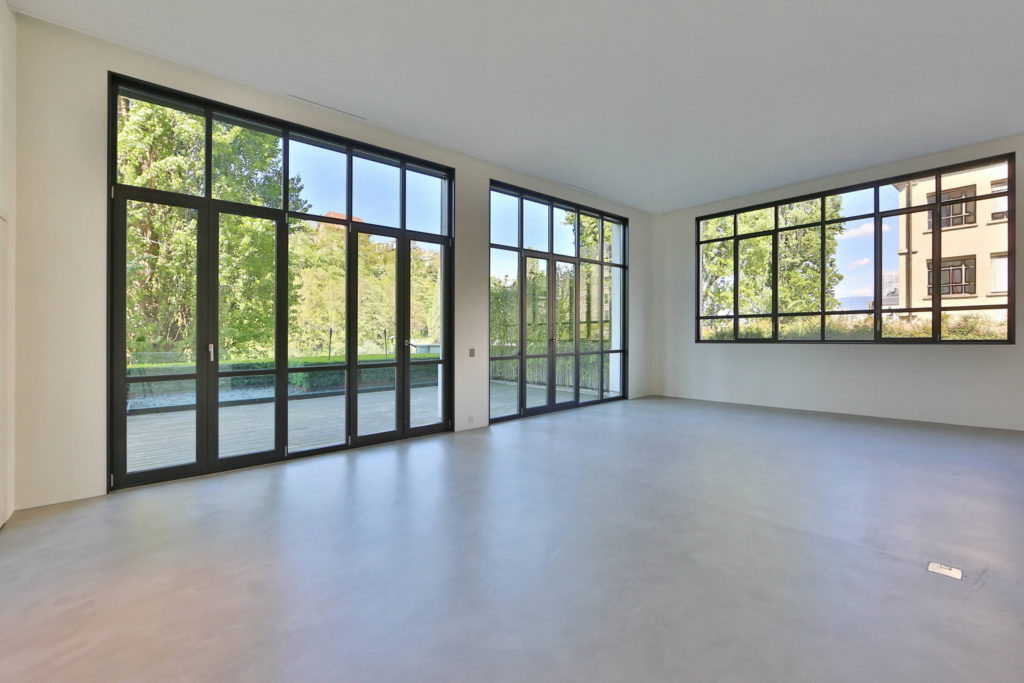 Sol en béton ciré sur ancienne chape cirée